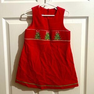 Hand smocked Christmas tree dress. Red corduroy. Size 4T. Worn once for a pic.